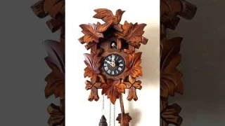 Small Leaf and Loon cuckoo clock. Made in Germany. Cuckoo bird pops out & calls hour and half hour.