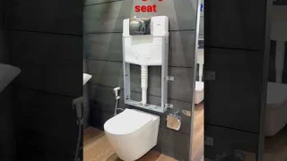 Wall hanging toilet seat