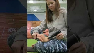 Using a Mini Massage Gun for Foot and Ankle Rehab