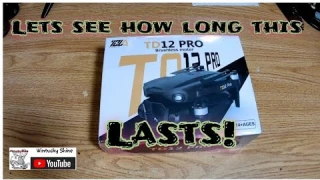 Toladrone TD12 PRO DRONE: Unboxing and maden flight...and crash! Don't have a clue what I'm doing!