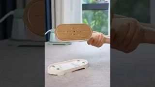 Effortlessly smooth your clothes with our portable mini garment steamer!