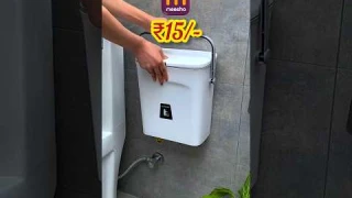 Wall-Mounted Trash Can is theultimate space-saver:Hangs on wall/cabinet bending for veggie peels