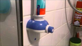 AUTOMATIC TOOTHPASTE SQUEEZING  DISPENSER REVIEW