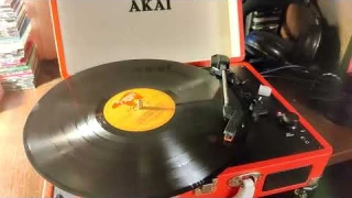 The cheapest portable record player VS. the cheapest VM95C cartridge on the regular turntable