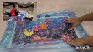 Tummy Time water mat infants and toddlers review. tummy time sensory playmat.