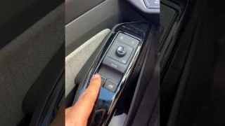 Weirdest car window switch. 3 buttons!