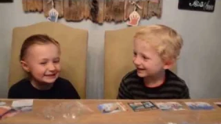 Two boys get a first look at Upper Deck's Dinosaurs cards!